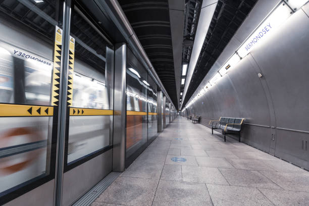 istock Futuristic architecture in deserted London underground station 1311591240