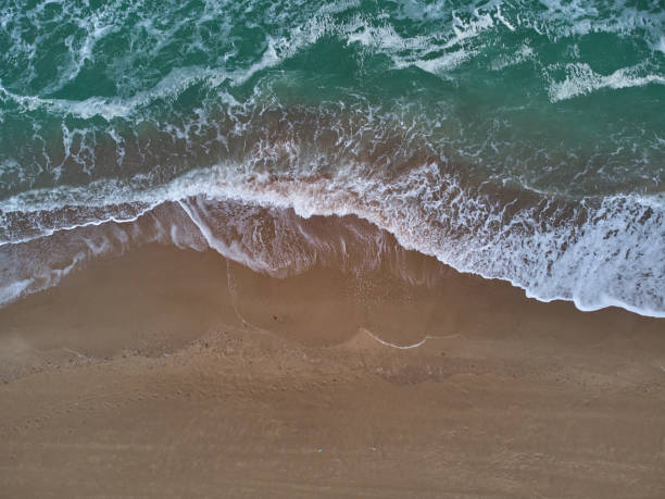 istock aerial view from drone on stormy sea and coast 1311599740
