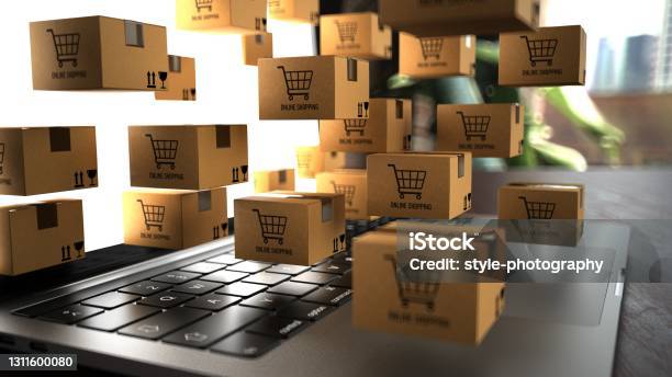 Small Shipping Packages On A Notebook With The Inscription Online Shopping Stock Photo - Download Image Now