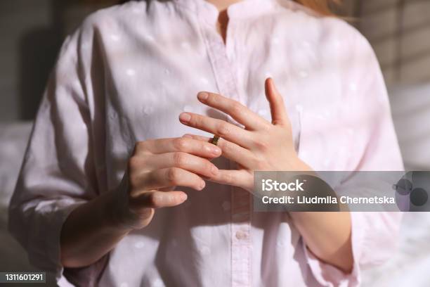 Woman Taking Off Wedding Ring Indoors Closeup Divorce Concept Stock Photo - Download Image Now