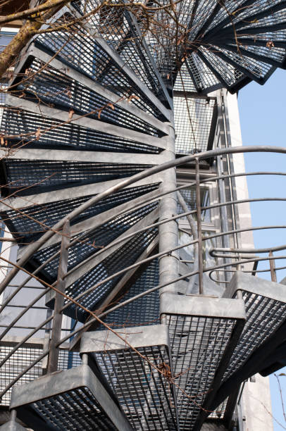 istock a helical fire escape at a modern building 1311601775
