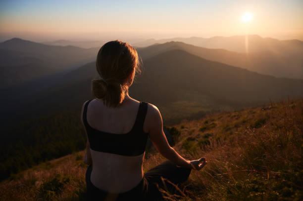 istock Brunette is practicing yoga in Lotus pose. 1311601884