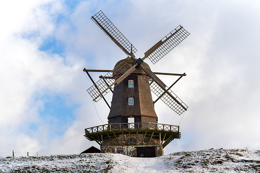 Windmill in a Dutch winter scene, near Oudega (Friesland, the Netherlands)