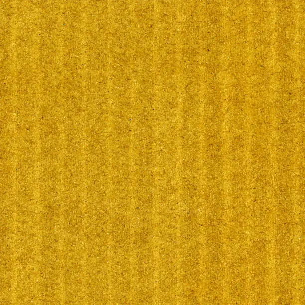 Vector illustration of Seamless recycled paper with messy grainy visible components and slightly visible vertical lines - vector illustration - abstract pattern design in shades of yellow - gold shimmering paper background.eps