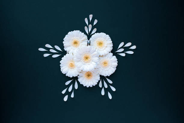 istock Coffee cup with  gerbera flower petals flatlay 1311609957