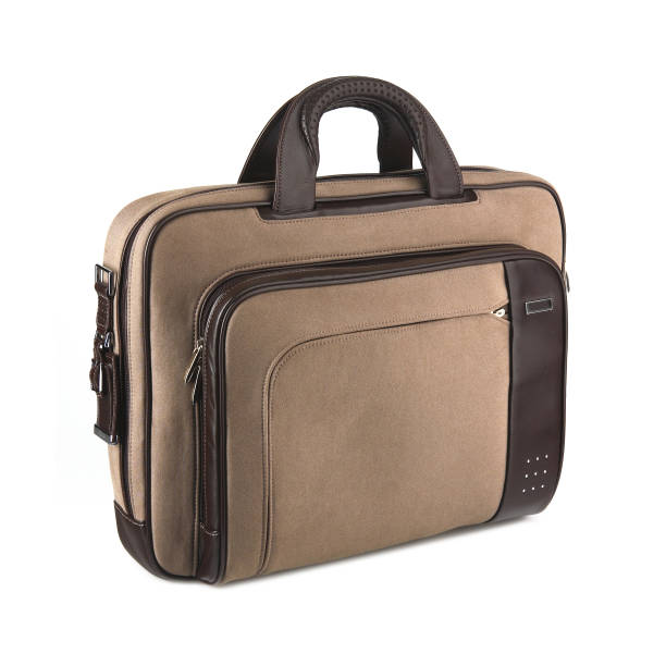 istock Brown fabric travel suitcase isolated on white 1311611428