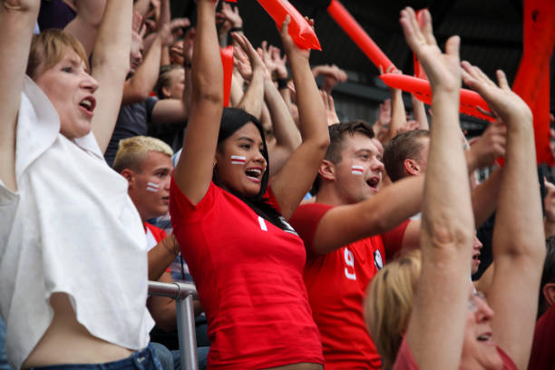 istock Ecstatic fans on the stadium cheering 1311611523