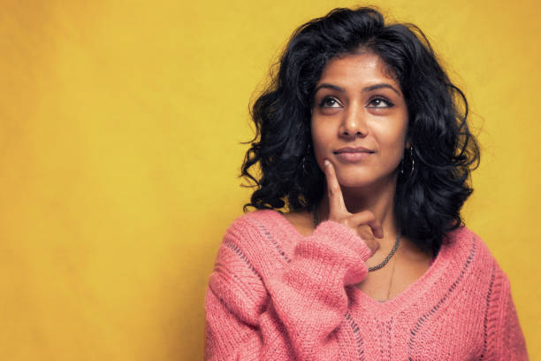 istock Beautiful thoughtful indian girl 1311612810