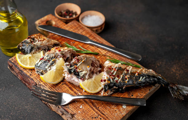 istock baked mackerel on a cutting board with lemon and spices on a stone background 1311613103