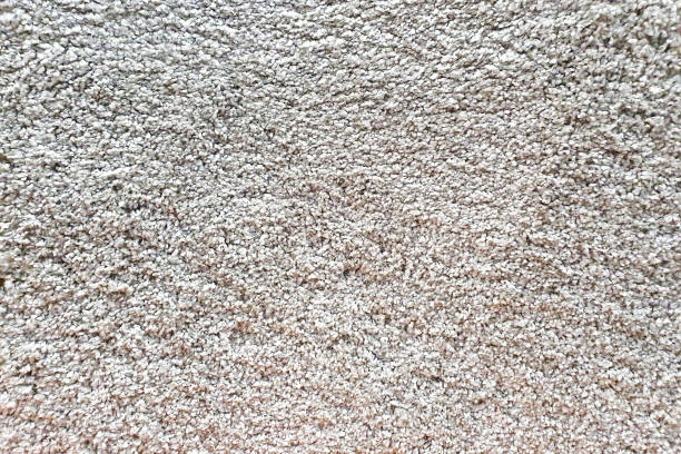 istock Gray long pile carpet texture background. Top view of bath mat. 1311614438