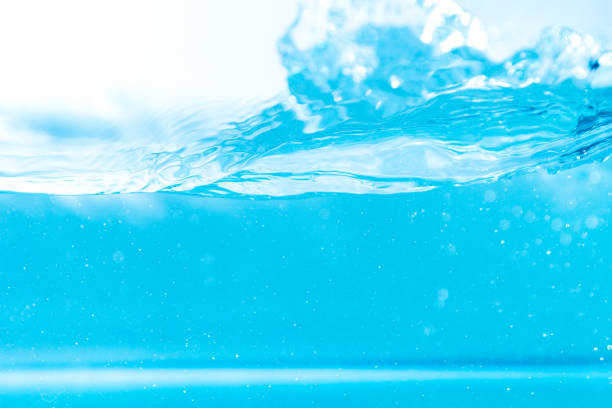 istock Water wave with bubble of air, on white background. Blue water 1311615988
