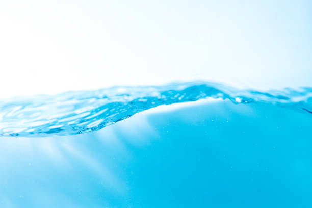 istock Water wave with bubble of air, on white background. Blue water 1311616142