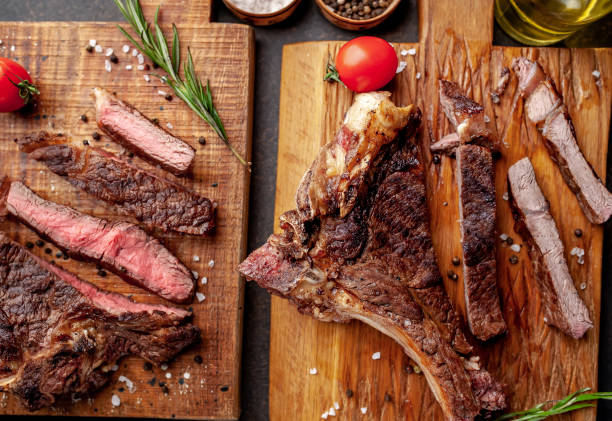 istock grilled beef steaks, different roasts on a stone background 1311617692