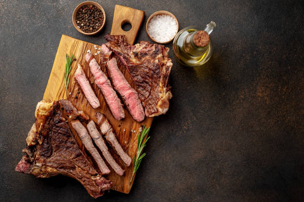 istock grilled beef steaks, different roasts on a stone background 1311618238