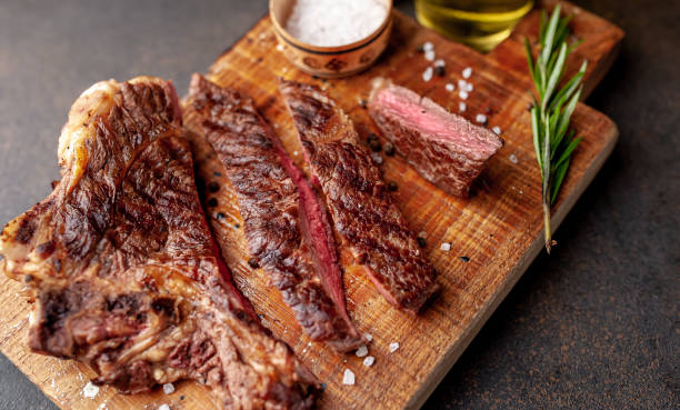 istock grilled beef steaks on stone background 1311618305