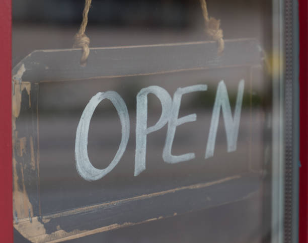 istock sign with the word open 1311620066