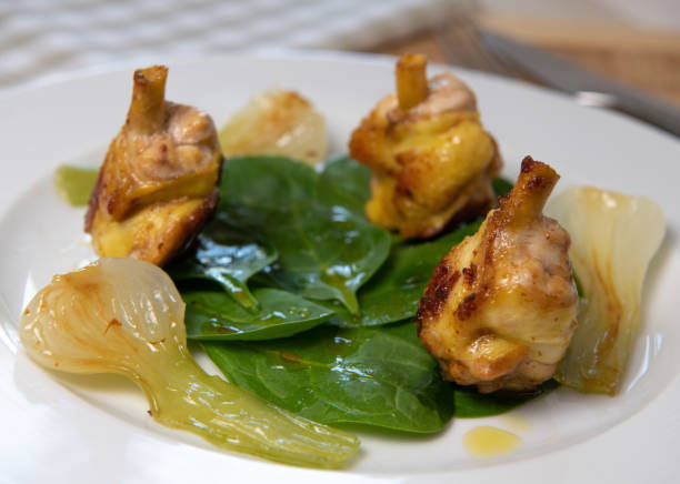 istock Fins, chicken drumstick, chicken, glazed onions, spinach leaves recipe 1311620996