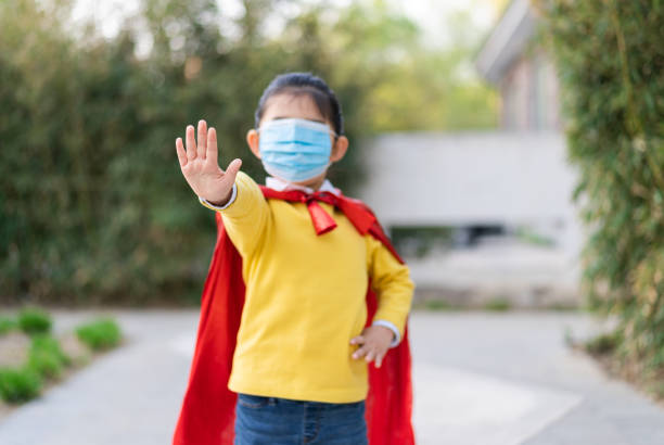 istock Mask Supergirl Make Stop Gesture 1311622742