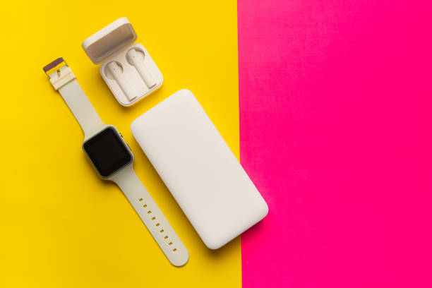 istock Layout of modern gadgets on a pink and yellow background . Online communication. Internet connection. Mobile communication. 5g. Black and white technology. Modern technologies. 1311622836