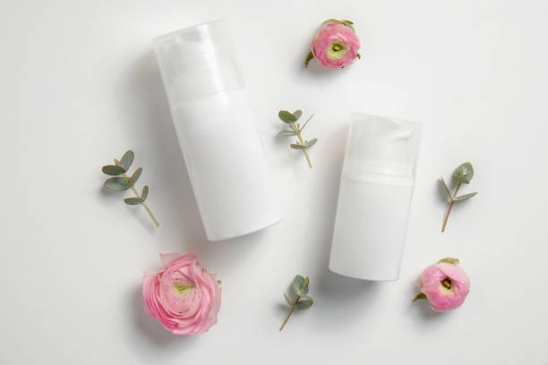 istock White cream bottles with dispencer. 1311623479