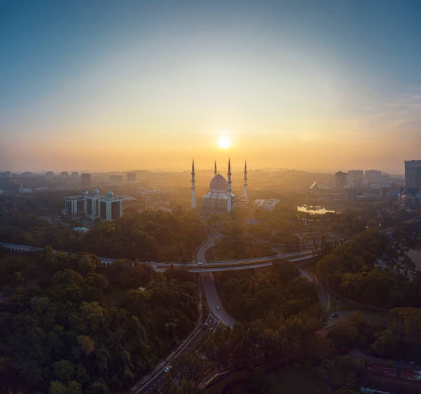 Shah Alam Blue Mosque golden sunrise