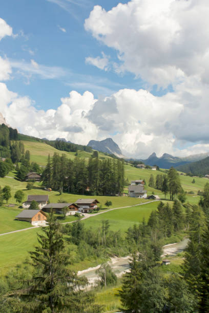 istock italian mountains landscape with clouds 1311623764