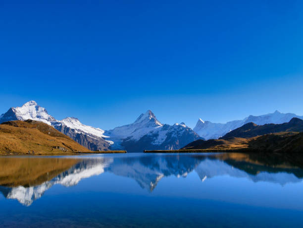 istock Swiss alps with mountain lake 1311627473