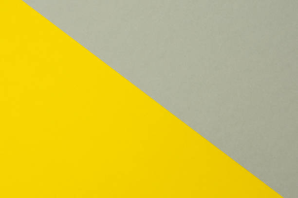 istock gray-yellow cardboard paper background, copy space 1311628751