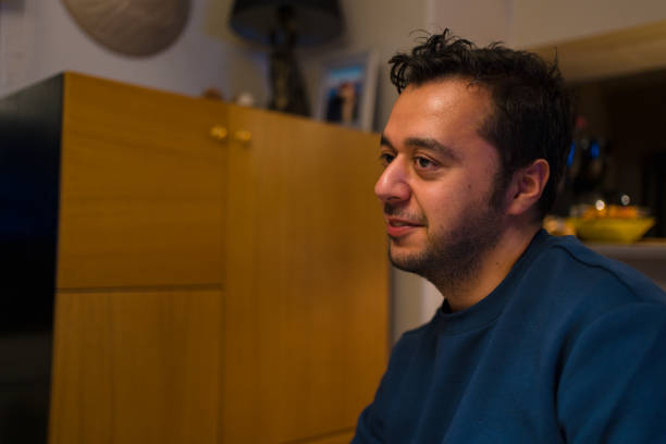 istock man smiling to his friend 1311629371