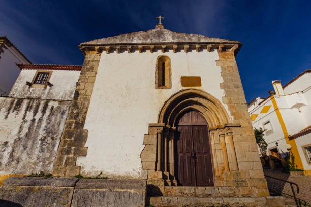 Óbidos, Portugal - December 10, 2018: facade of the Capela de San Martinho ( Saint Martin's Chapel ) in Óbidos, in the Leiria District of Portugal.