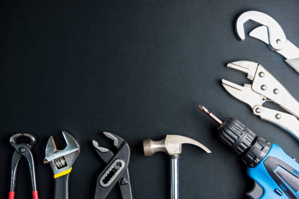istock Construction tools on Gray-black cement floor background with copy space.Home Repair concept, Repair maintenance concept, Renovation concept. 1311631684