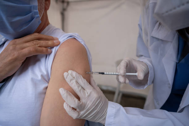 istock Close-up on a man getting the COVID-19 vaccine 1311635534