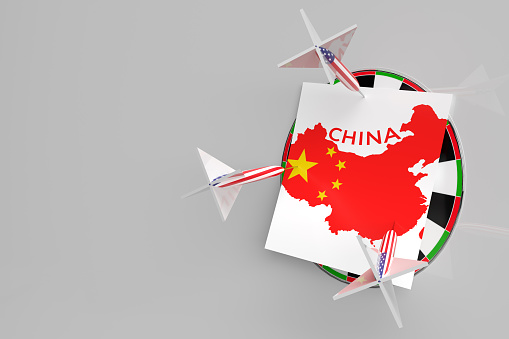 Simple 3d background with a dart board with a map of China and arrows with the US flag stuck into it. Illustration of political relations between the countries of the East and America.