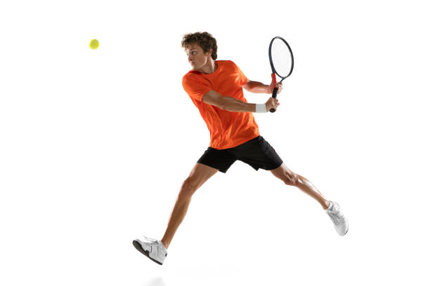 istock Young Caucasian man, tennis player training isolated on white background. 1311637102