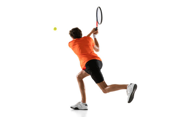 istock Young Caucasian man, tennis player posing isolated on white background. 1311637103