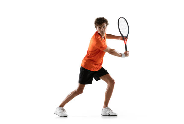 istock Young Caucasian man, tennis player posing isolated on white background. 1311637104