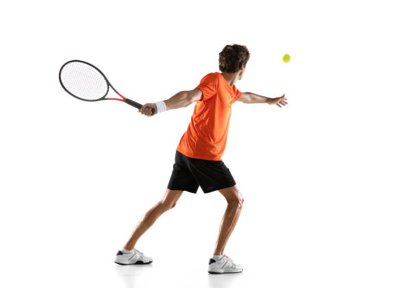 istock Young Caucasian man, tennis player posing isolated on white background. 1311637107