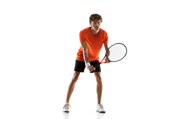 istock Young Caucasian man, tennis player posing isolated on white background. 1311637108