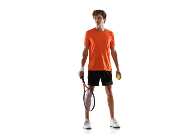 istock Young Caucasian man, tennis player posing isolated on white background. 1311637110