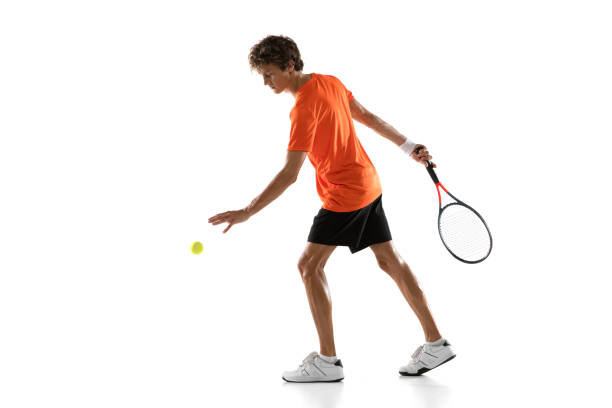 istock Young Caucasian man, tennis player posing isolated on white background. 1311637120