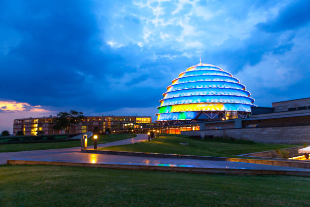 Kigali Convention Centre Dramatic photo of Kigali Convention Centre at night on cloudy evening. kigali convention center stock pictures, royalty-free photos & images