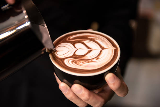 istock Barista make latte art 1311637450