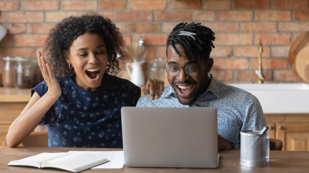 istock Amazed black spouses get super offer from web store online 1311638330