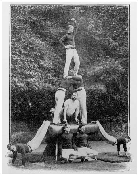Antique black and white photograph: Blind gymnasts Antique black and white photograph: Blind gymnasts acrobatic gymnastics stock illustrations