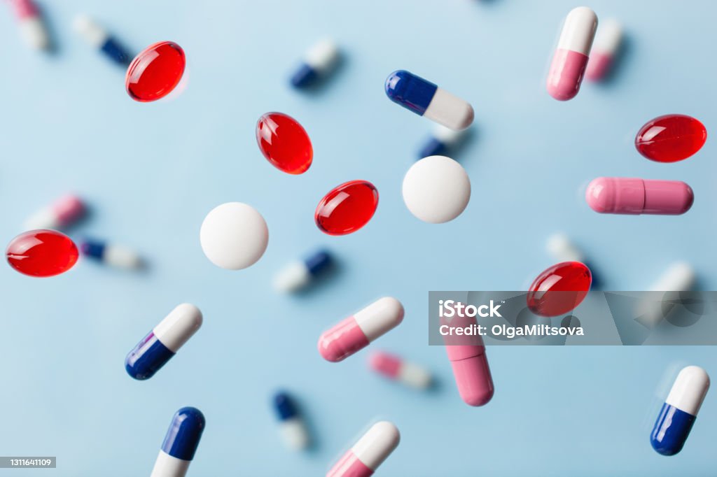flying pill tablet capsule levitation medicine. medical treatment for disease flu virus Pill Stock Photo