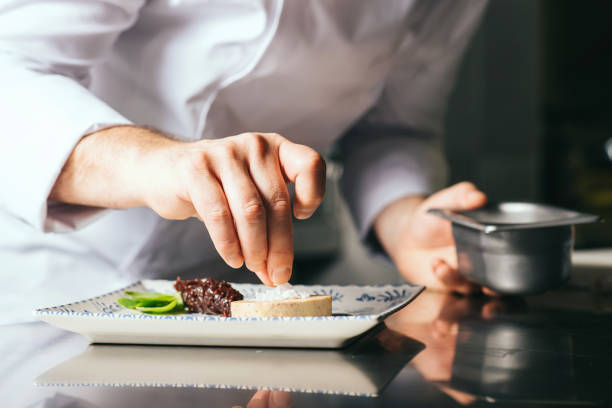 istock the chef decorates a plate of foie gras 1311645014