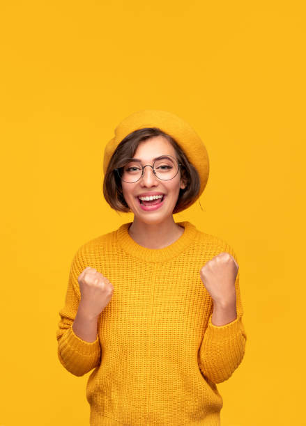 istock Happy young woman celebrating success 1311645665