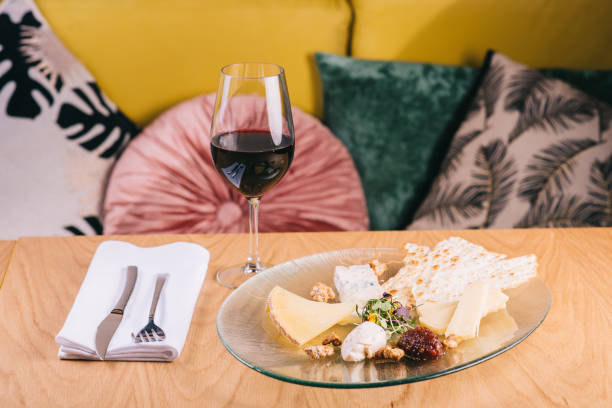 istock Cheese plate on the table with grapes and nuts Snacks for wine 1311645915