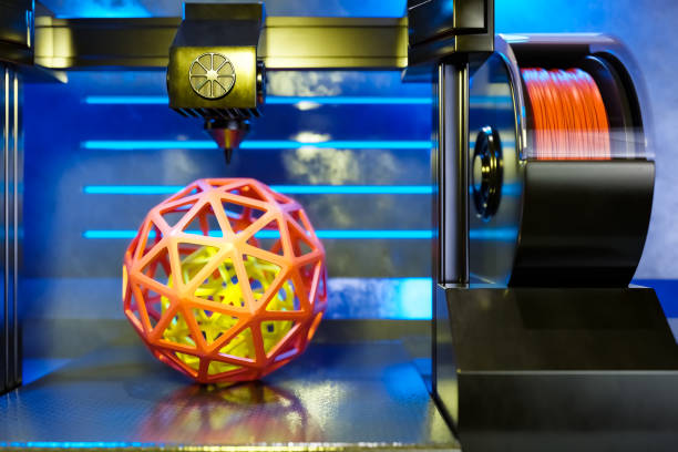 istock 3d rendering of automatic three-dimension 3D printer printing the geometric sphere from hot molten plastic. 1311646119