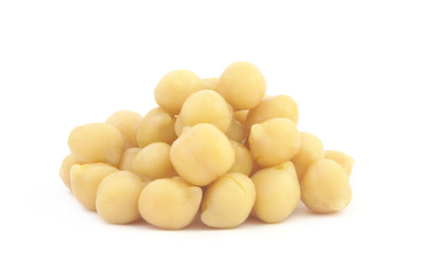 istock Heap of chick peas isolated on white 1311646155